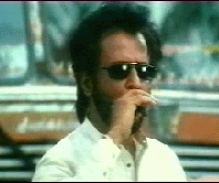 Image result for tossing cigarette by rajinikanth gif