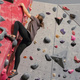 A student boulders at the Western Colorado University Fieldhouse