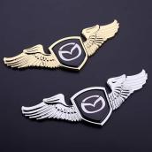Biểu tượng cánh thiên thần có 2 màu bạc vàng Mazda