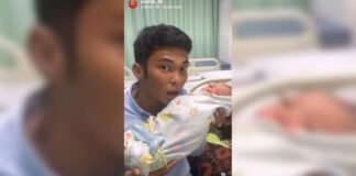 video seorang ayah yang keliru mengumandangkan takbiran pada bayinya