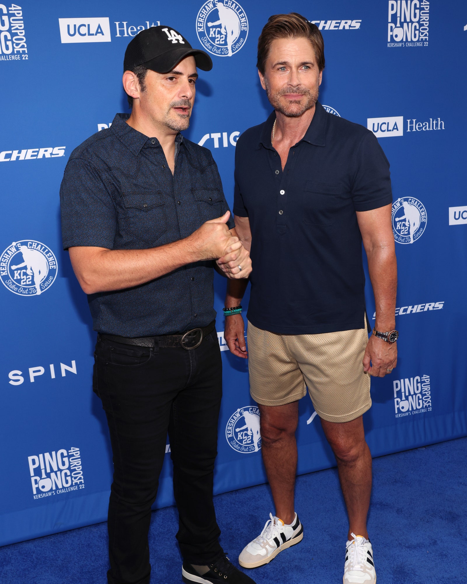 Image may contain Clothing Shoe Footwear Apparel Human Person Rob Lowe Brad Paisley and Fashion