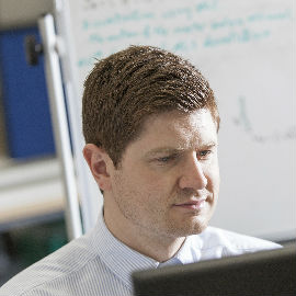 a man wearing a suit and tie