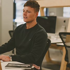 a man sitting at a desk