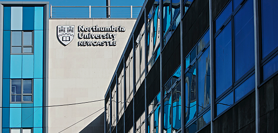 Exterior of Ellison building at Northumbria University- blue and grey building with Northumbria logo on