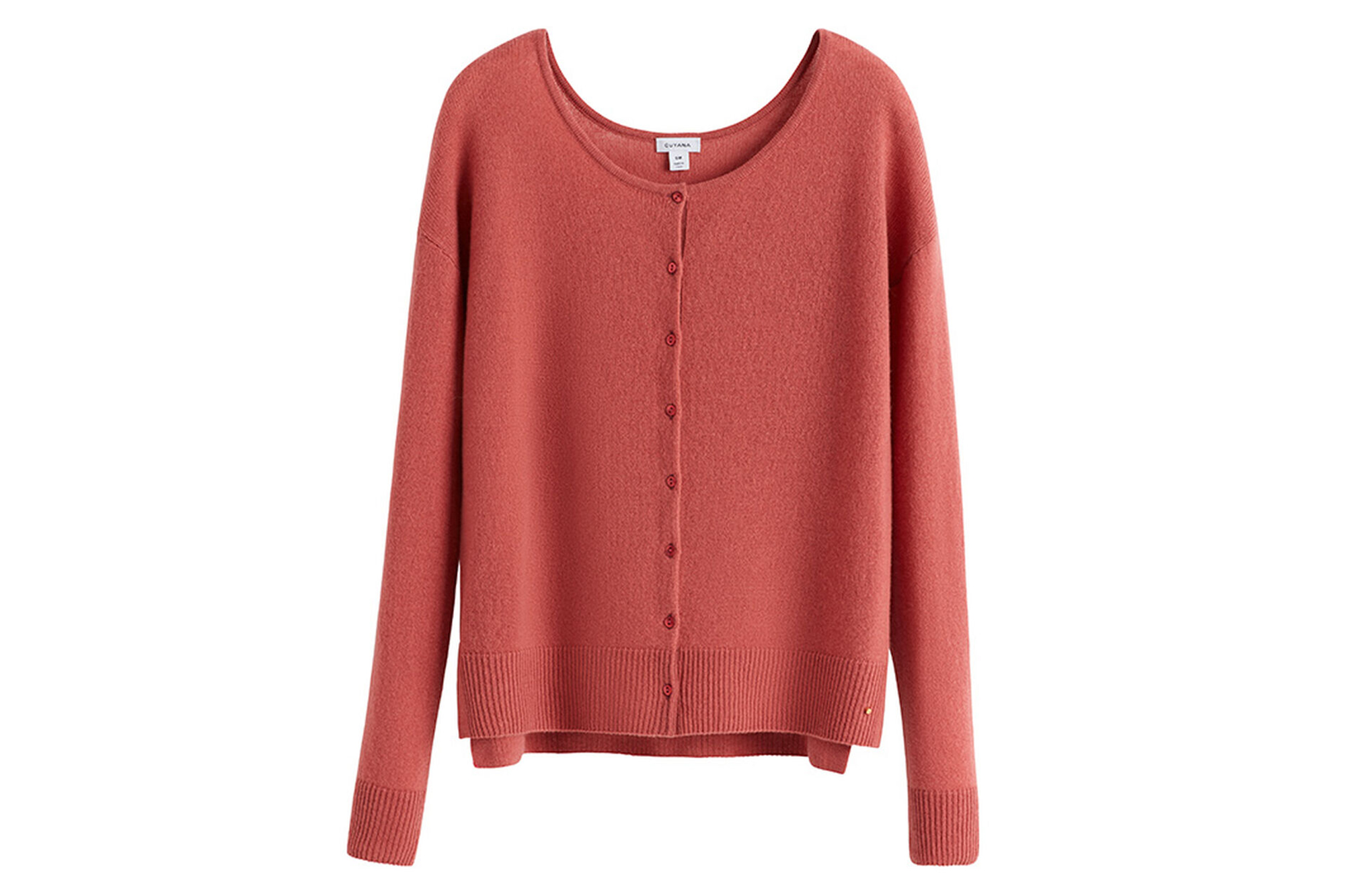 A light pink salmon colored sweater 