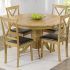 Round Oak Extendable Dining Tables and Chairs