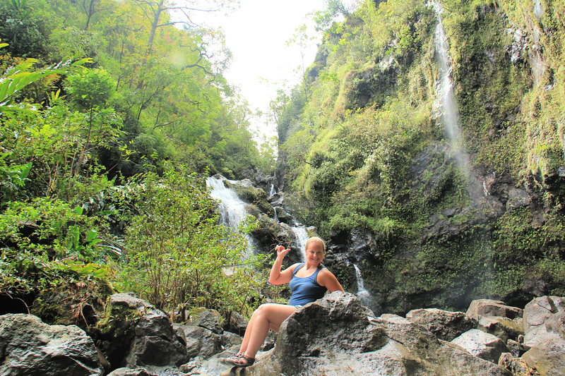 Lina Stock of Divergent Travelers Adventure Travel Blog at three bears waterfall on the road to Hana