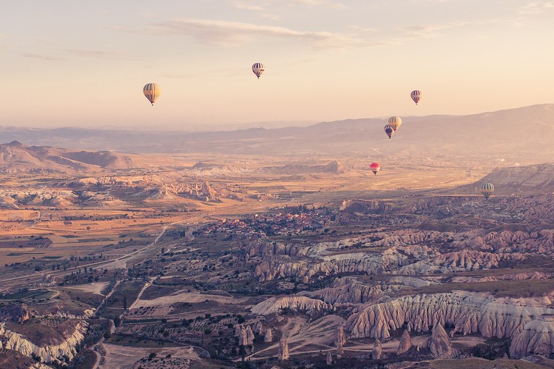 Hot air balloons over a Turkey landscape
