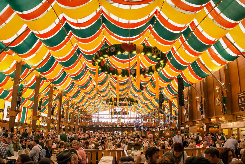 People drinking in the Hippodrom Beer Tent on the Theresienwiese Oktoberfest fair grounds