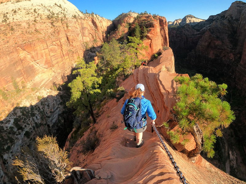 Lina Stock of Divergent Travelers Adventure travel blog hiking angles landing in Zion National Park.