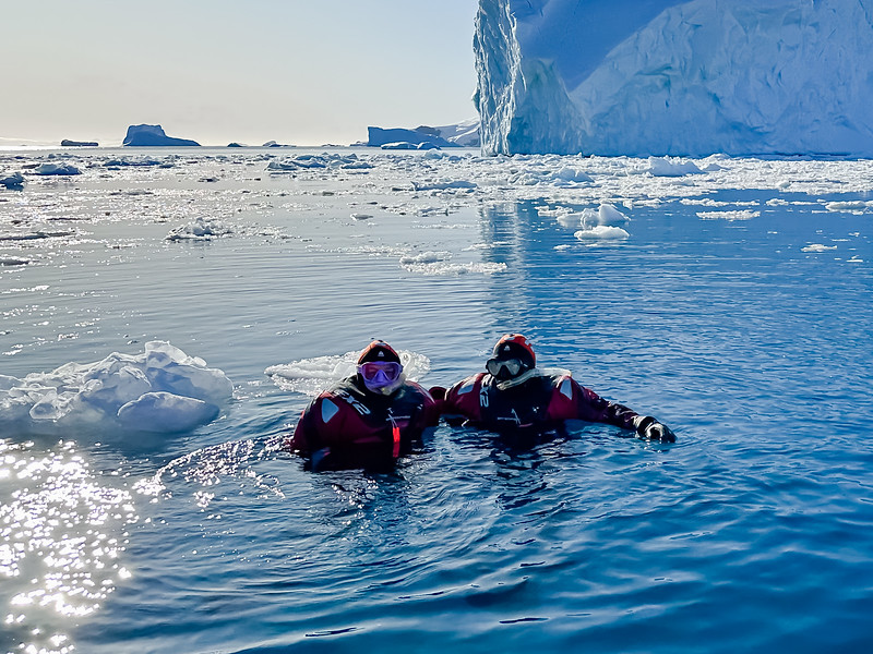 David & Lina Stock of Divergent Travelers snorkeling in Antarctica 
