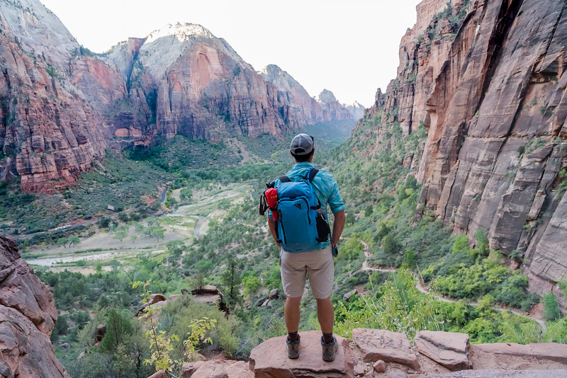 David Stock Jr of Divergent Travelers Adventure Travel Blog exploring Zion National Park in the Summer.