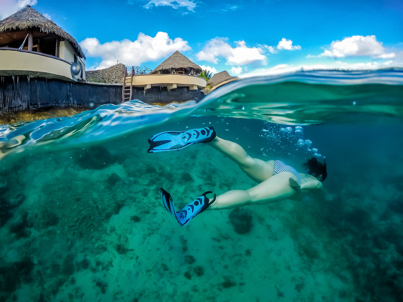 LIna Stock of the Divergent Travelers Adventure Travel Blog snorkeling in Vanua Levu.