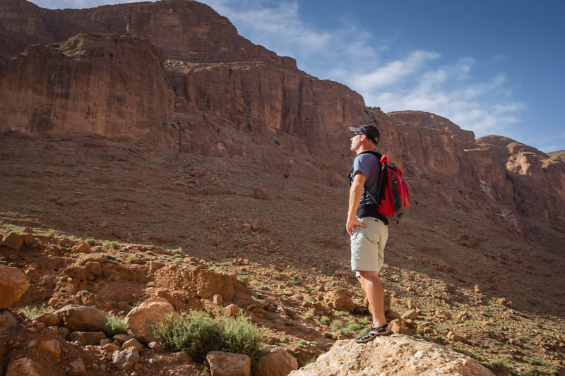David Stock Jr of Divergent Travelers Adventure Travel Blog hiking in Dades Gorges, Morocco 