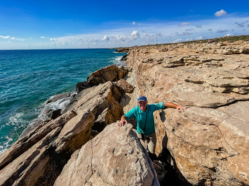 David Stock bouldering along the coast in Cyprus near Cape Greco