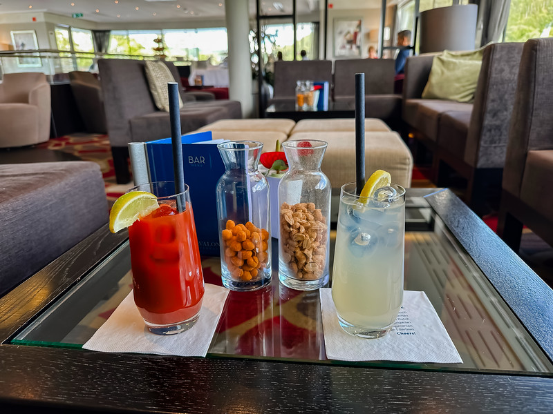 Two drinks on a table in the lounge of Imagery II with Avalon Waterways