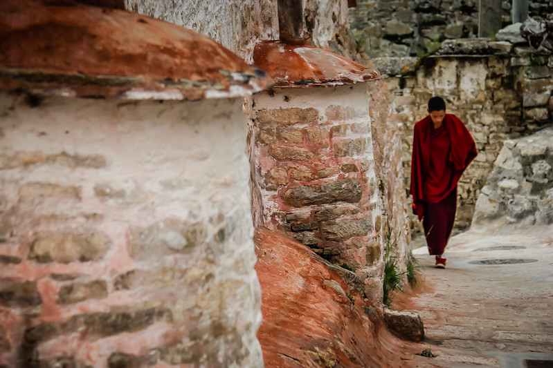 Monk walking in Tibet