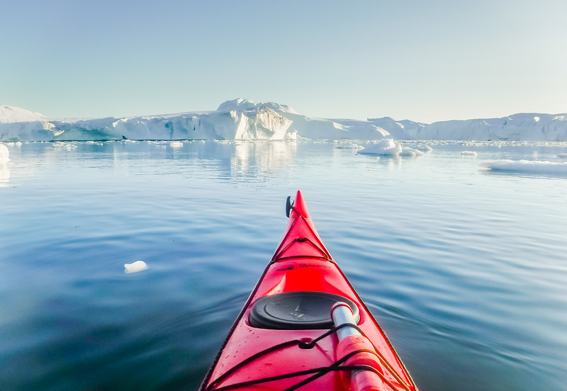 Lina Stock of Divergent Travelers Adventure Travel blog kayaking in ilulissat Greenland 