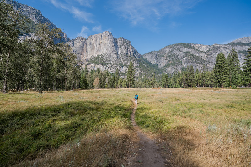 David Stock hiking across Cook's Meadow - Yosemite Photography spots