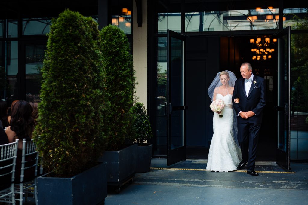 Bride being escorted to ceremony by her father at Vie Philadelphia