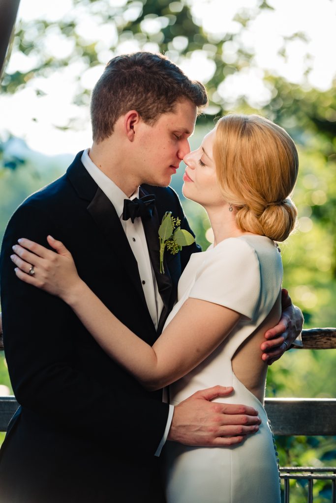 romantic image of bride and groom at their Morris Arboretum Wedding