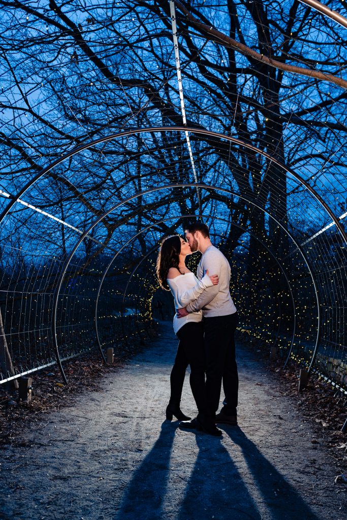 couple posing for their e-session at longwood gardens