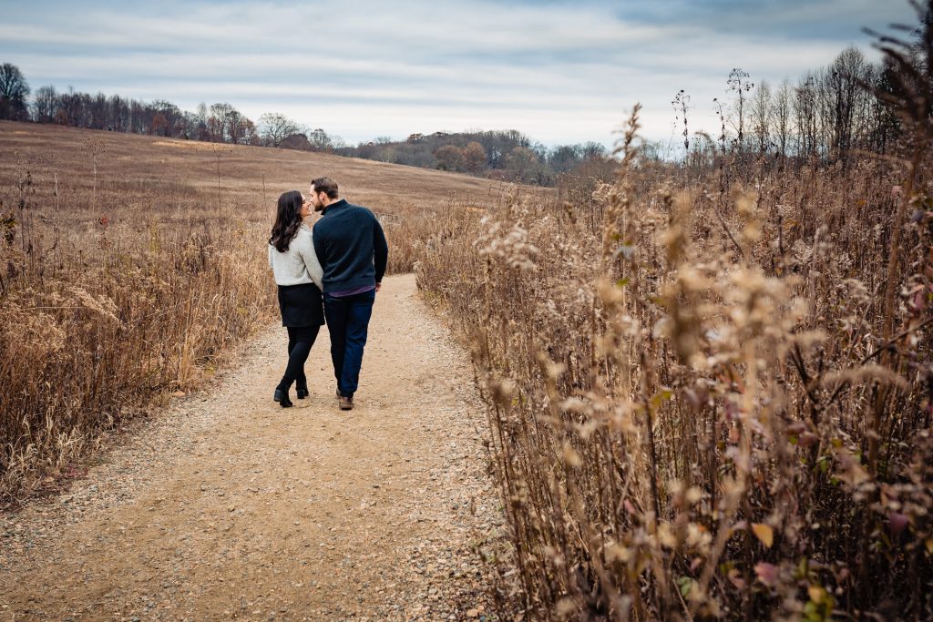 a fall engagement shoot taken at the 86 open acres of designed natural landscapes of the meadow garden section of longwood gardens