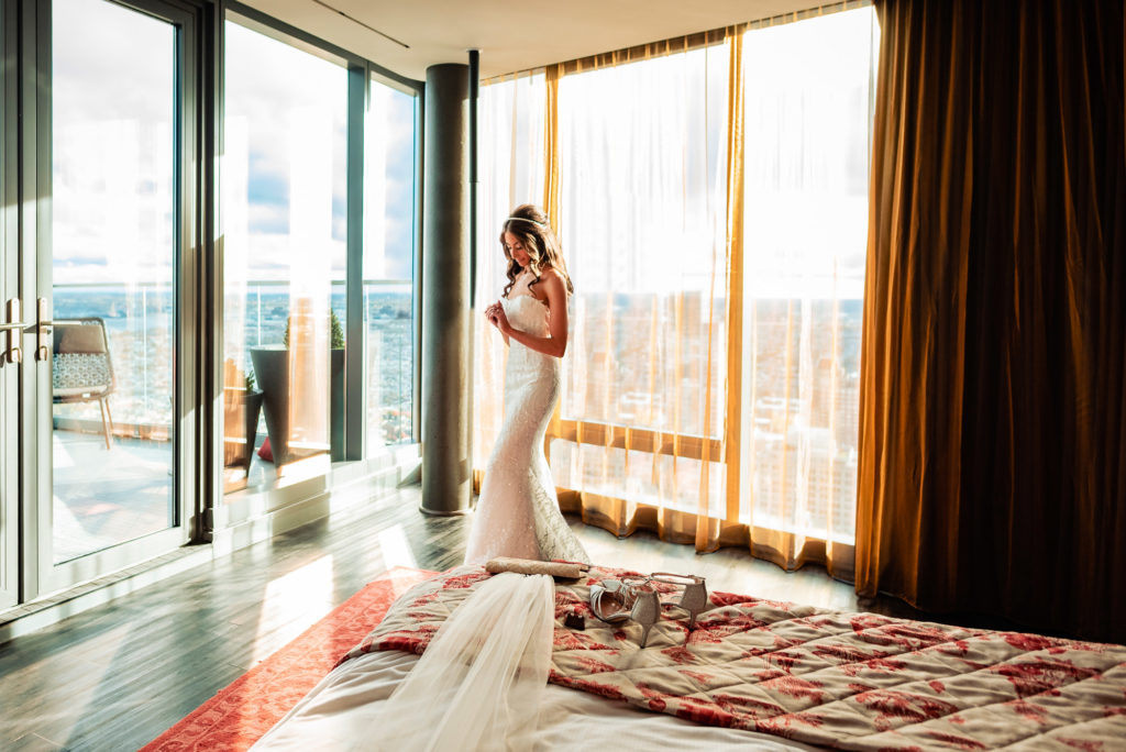 bride getting ready in her suite at the W Hotel Philly