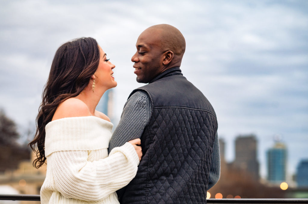 a smiling couple during their Philly Art Museum E-Session