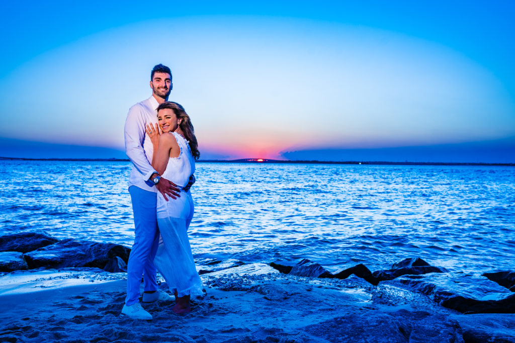 couple are all smiles at the beach in their Margate new jersey e-session