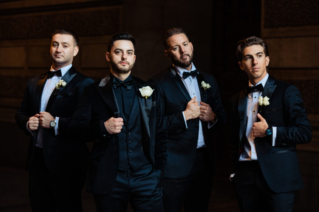 groom and his grooms men takes a serious pose for the camera