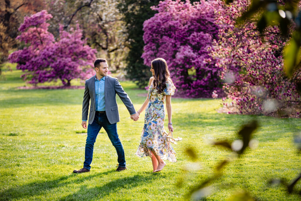 an engagement shoot taken at the Rose Garden section of longwood gardens complete with a mix of perennials, grasses, small trees, shrubs, and evergreens provide a continuous color of the garden
