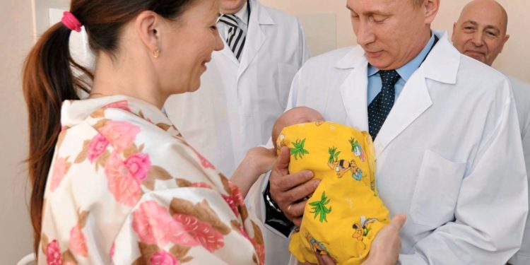 Vladimir Putin and a baby