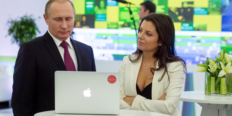 Editor-in-chief of RT TV channel Margarita Simonyan and Russian President Vladimir Putin