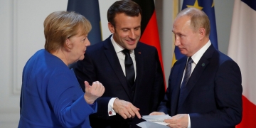 Russian President Vladimir Putin, French President Emmanuel Macron and German Chancellor Angela Merkel