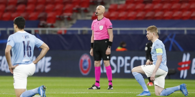 The refusal of the referee team led by Sergei Karasev to get down on one knee before the start of the second leg of the 1/8 finals of the UEFA Champions League