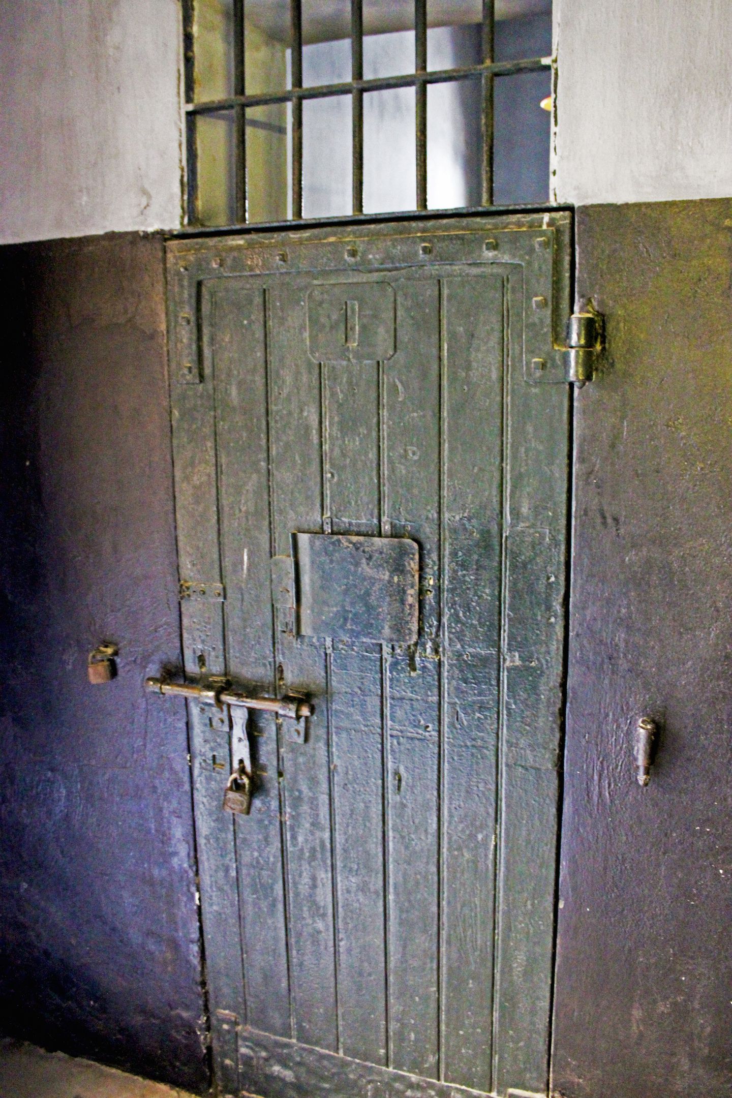 Door to the prisoners' cell at the Hoa Lo Prison