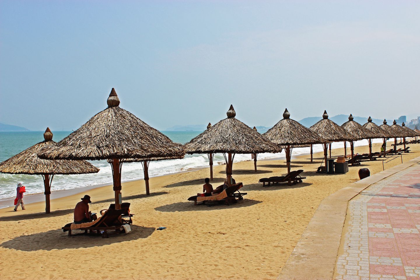 Line of straw huts on the Nha Trang Beach
