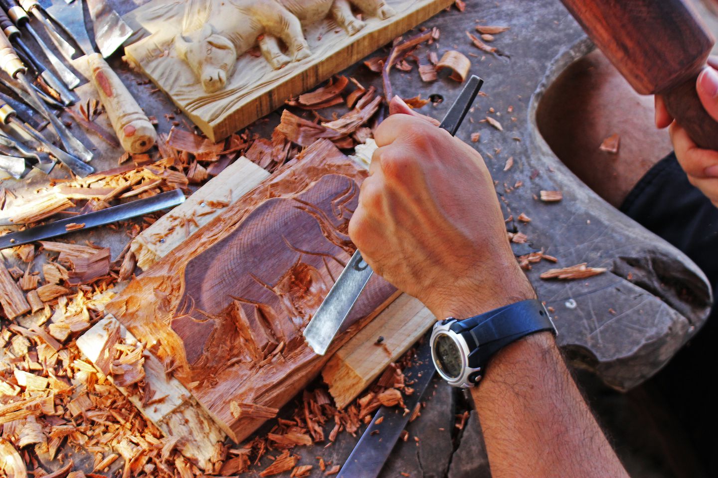 Carlos learning wood carving with the Backstreet Academy, Vientiane, Laos