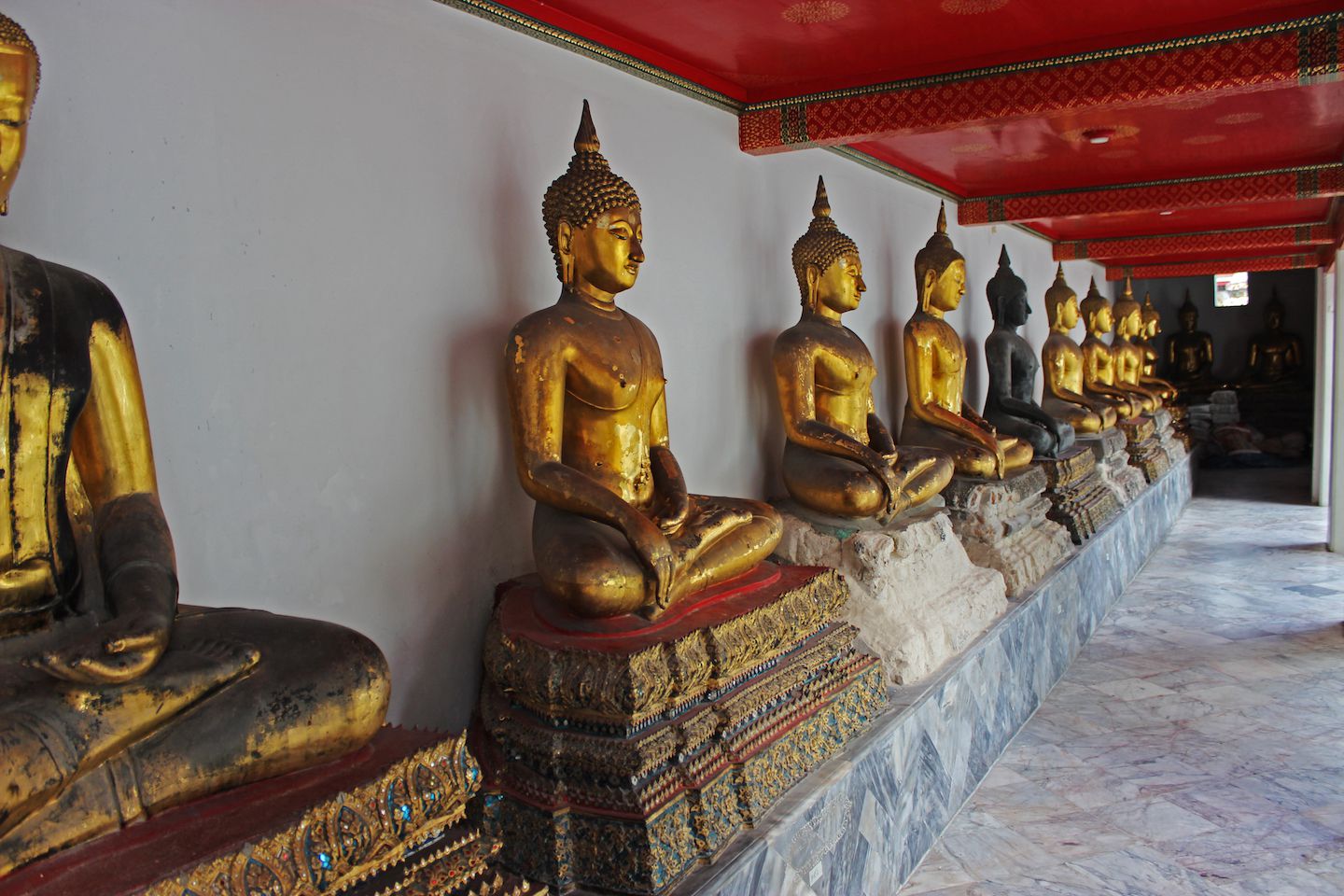 Line of Buddha statues at Wat Pho