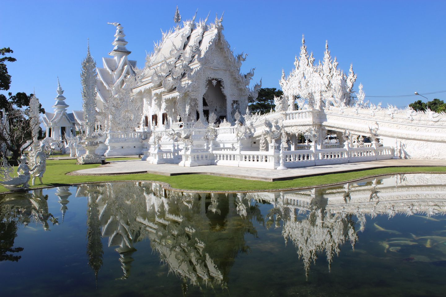 Reflections of the White Temple in Chiang Mai