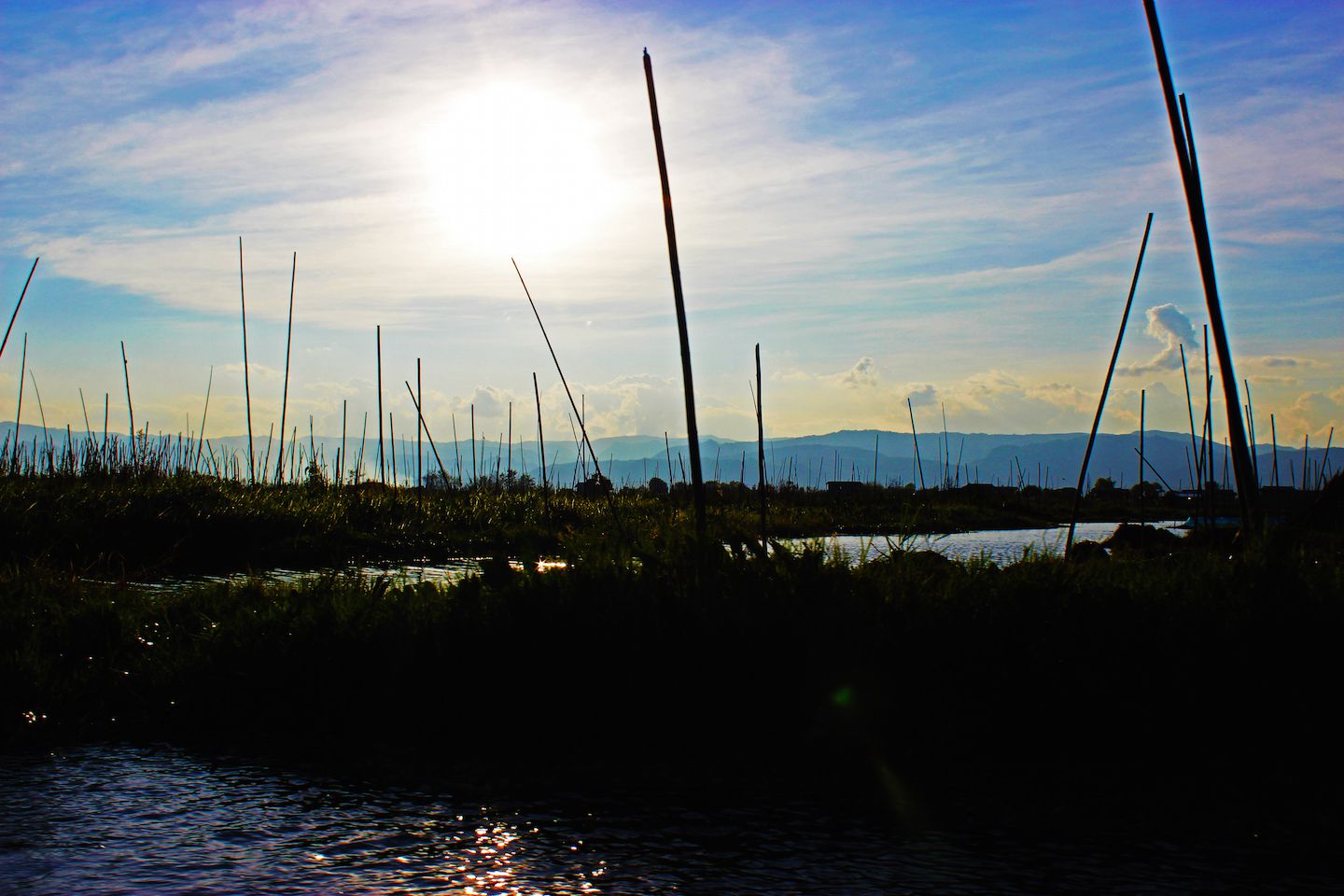 Sunset over the floating gardens of Inle Lake, Myanmar