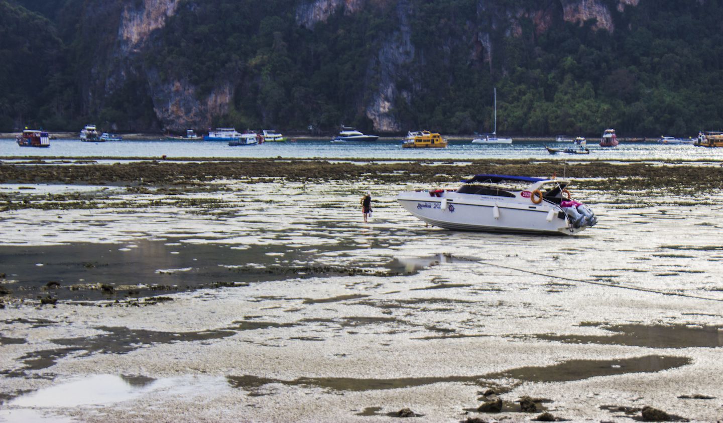 Stranded boat during low tide on Koh Phi Phi, Thailand