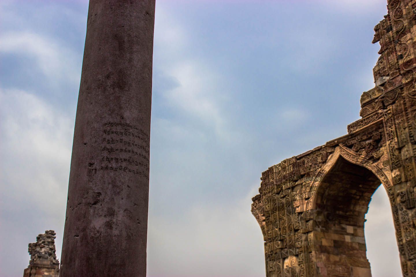 Quran verse on the Iron Pillar, Qutb Minar, New Delhi, India