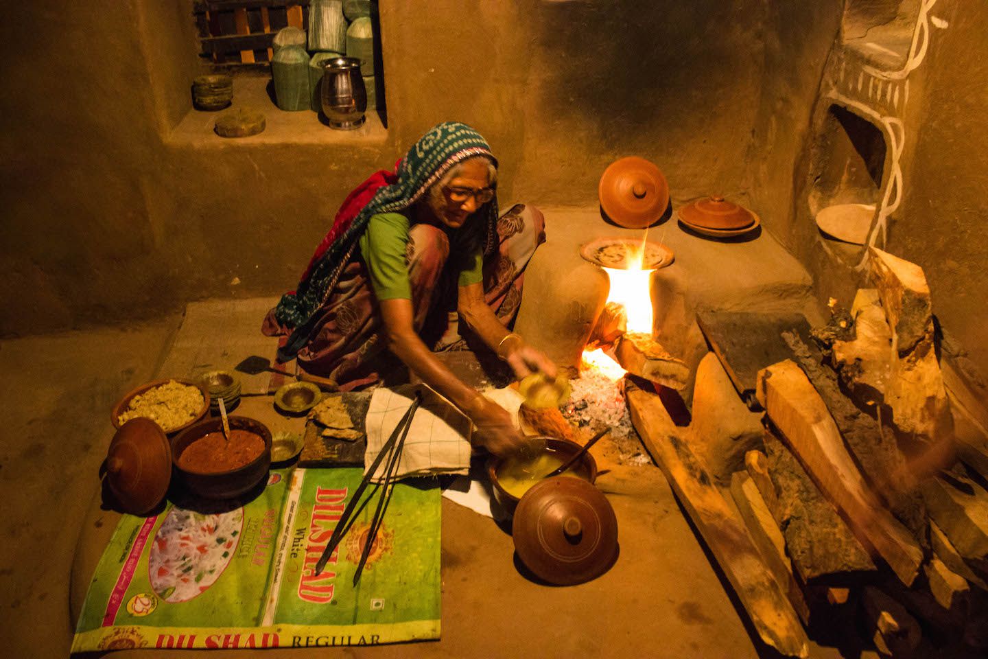 Cooking typical food at Choki Dhani, Jaipur, India
