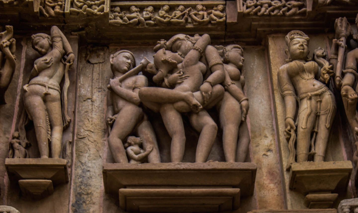 Acrobatic sex position on the walls of the Lakshmana temple, Khajuraho, India