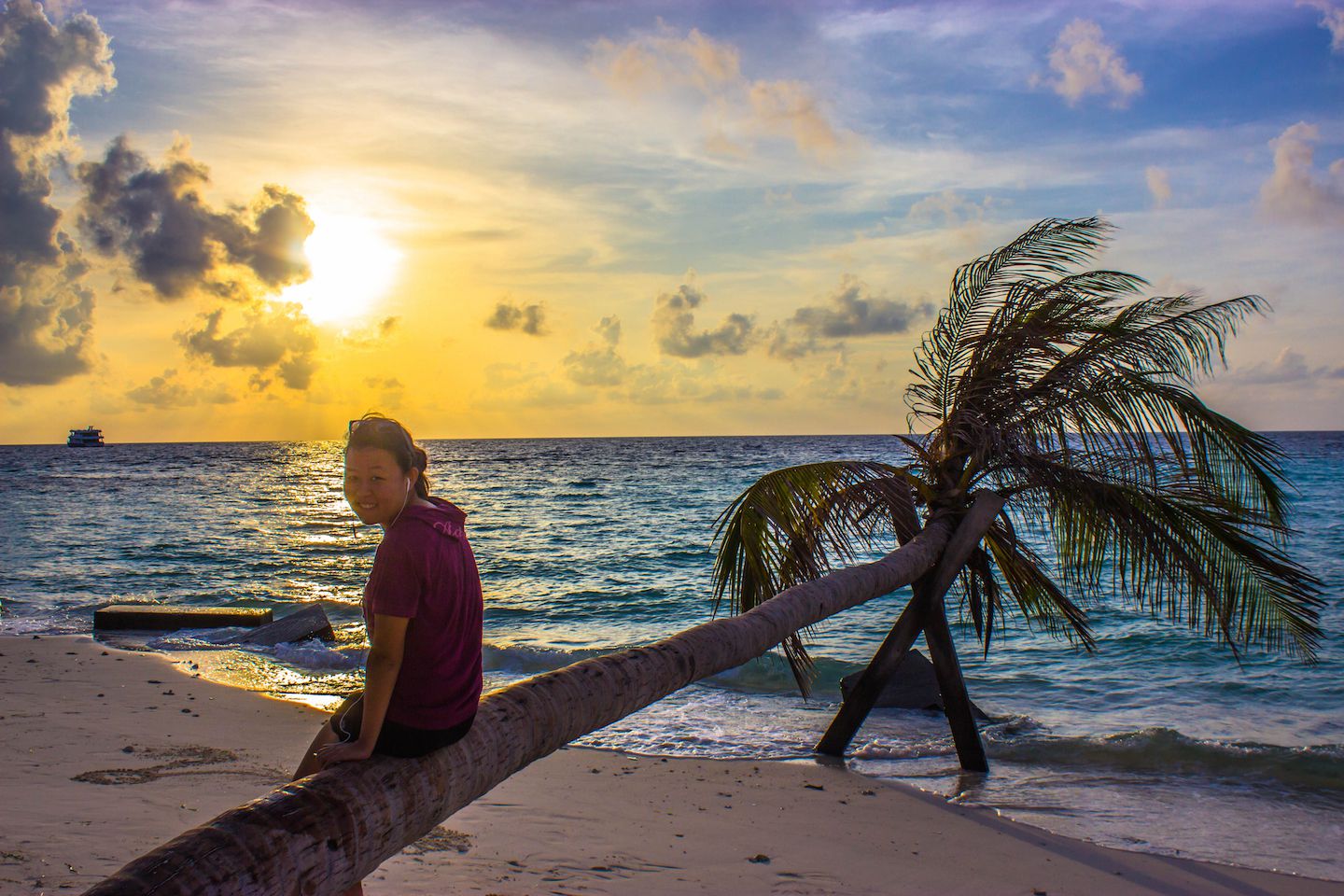 Julie enjoying the sunset in Maafushi, Maldives