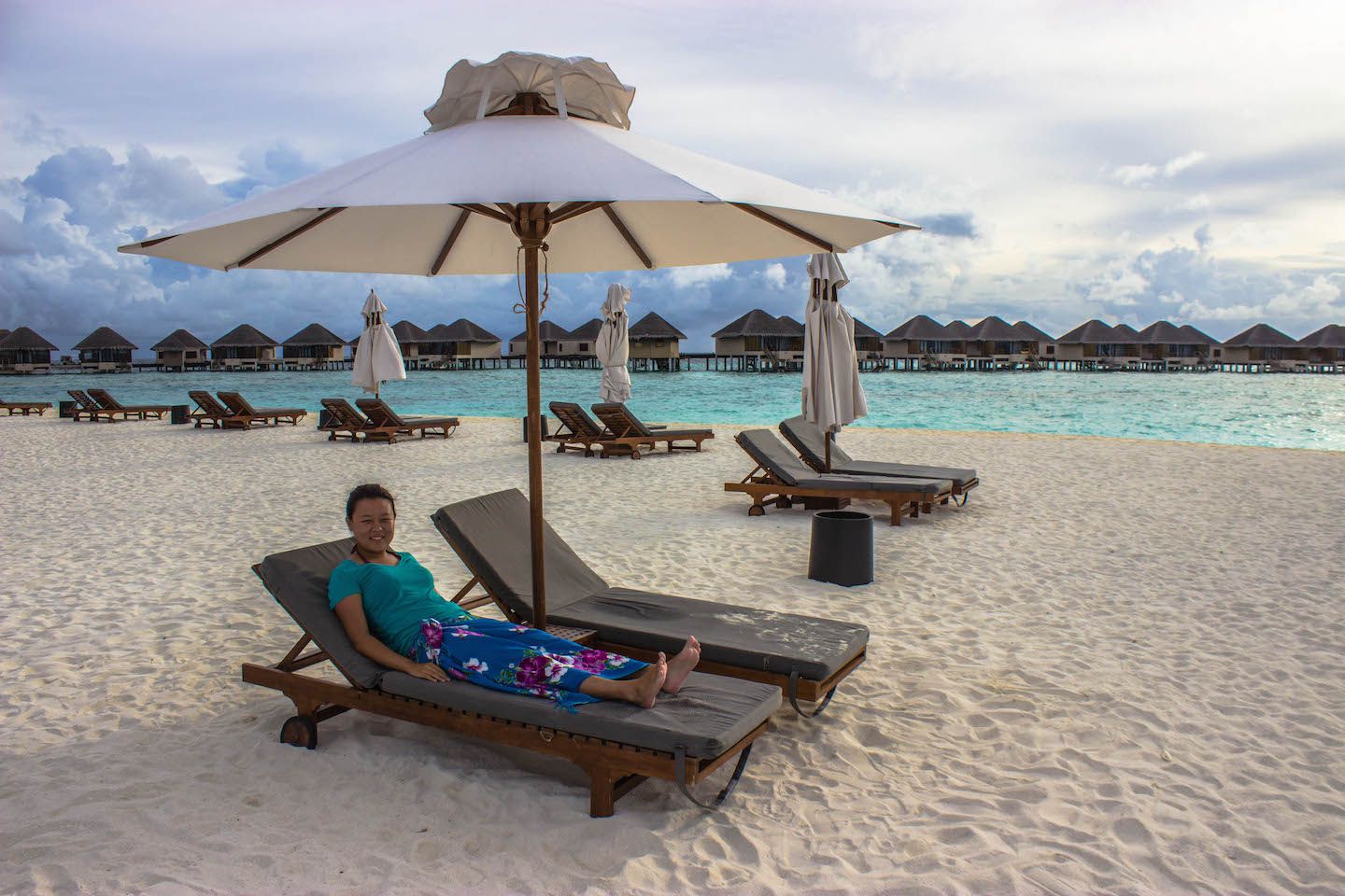 Julie sitting on the beach chair, Vadoo Resort, Maldives