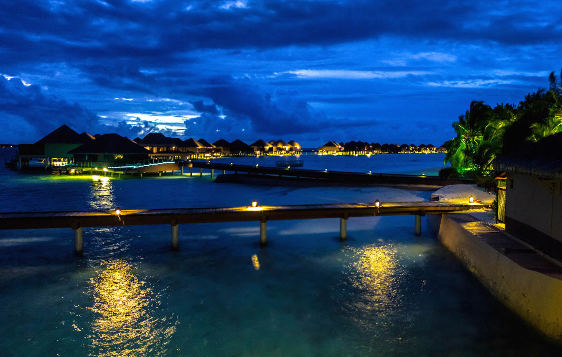 Panoramic view of the water bungalows at night, Vadoo Resort, Maldives