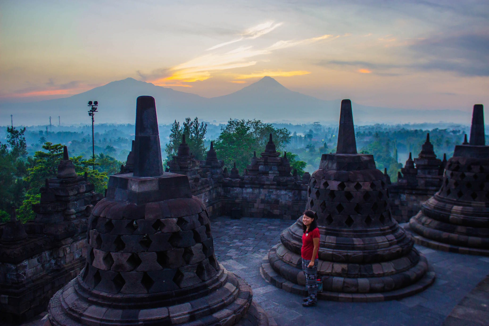 Julie and the sunrise over Borobudur, Indonesia